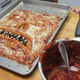 Illustration for article titled Pizza Necronomicon is deliciously horrific